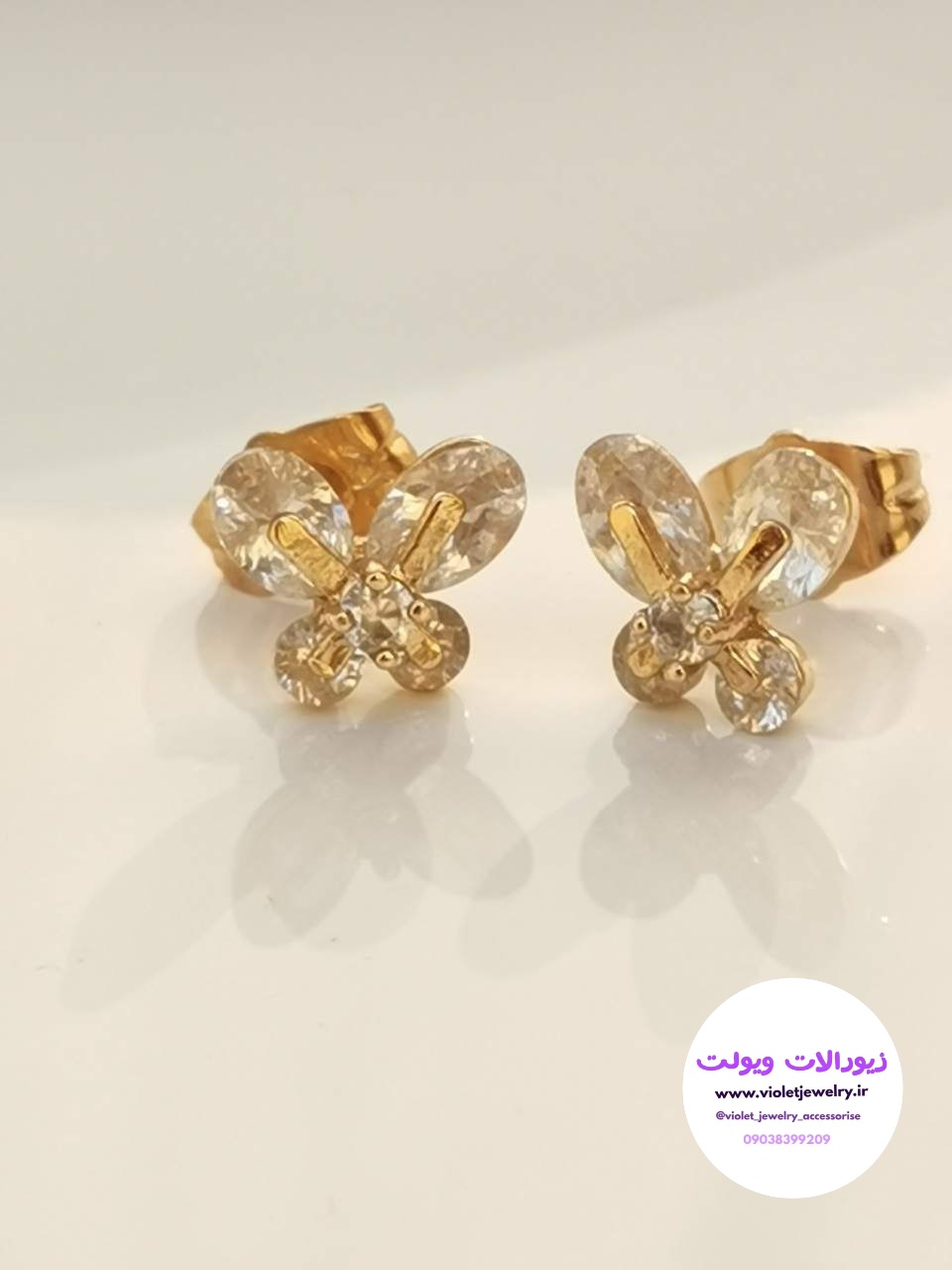 گوشواره میخی نگین دار طلائی طرح پروانه برند ژوپینگ کد ۱۱۵۷