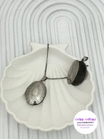 لاکت جاعکسی طرح بیضی استیل رنگ نقره ای کد  99109