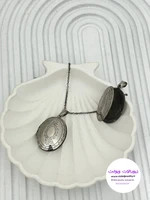 لاکت جاعکسی طرح بیضی استیل رنگ نقره ای کد 99109